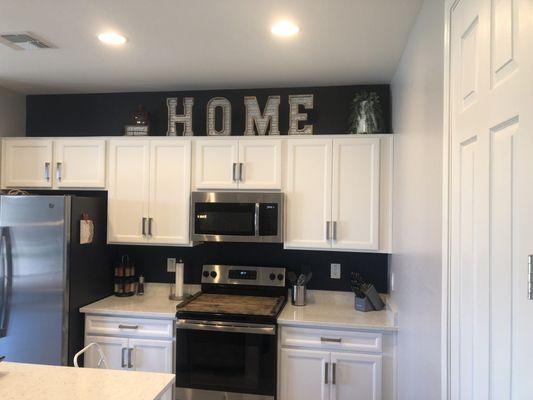 Kitchen with blue accent wall