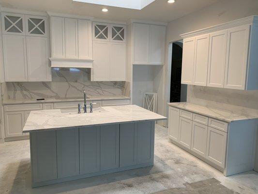 Beautiful remodeled kitchen, with custom quartz countertops.