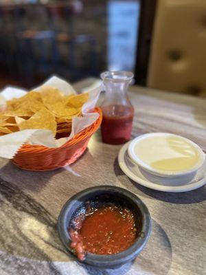 Queso cheese dip and Salsa