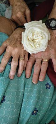 My parents and their freshly fitted rings