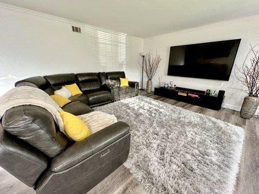 Living room- leather sectional prefect for football