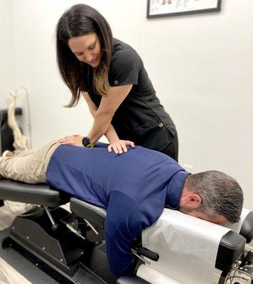 Dr Stefanie Tropea, DC ProClinix Armonk Chiropractor utilizing flexion distraction to address low back pain and herniated discs