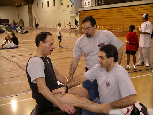 Dr. Charschan working at a track meet