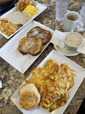 Chicken fried steak California omelette with a biscuit and a side of gravy! Side of French toast  Hot coffee