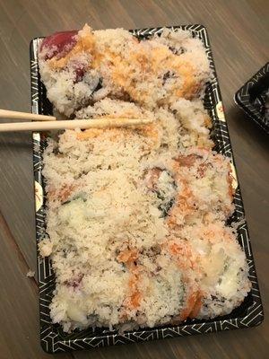 Sloppy sushi - covered in some kind of flakes - you can't even see the sushi