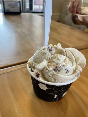 Two scoop cup with butter pecan and cookie dough!