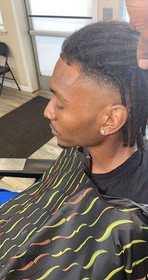 Dreads with bald fade