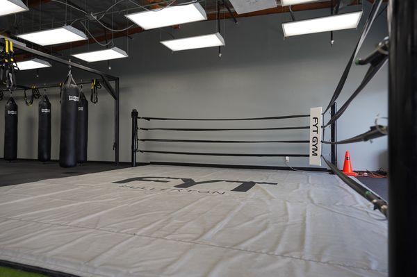 Our boxing ring! DM us for a boxing or kickboxing session! We offer one free lesson/group class! Instagram: @fytgym