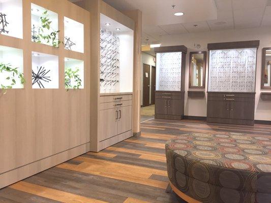 Comfortable and calm waiting area, exam rooms and glasses display for vision care patients.