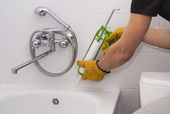 Caulking around baths and sinks. Replace old caulk and waterproof around sinks, baths and showers.