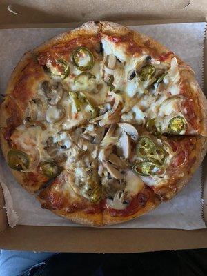 Pepperoni,mushroom, jalapeños and onion. Yummmmm