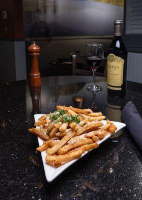 parmesan truffle fries, crispy battered fries, truffle oil, parmesan cheese, rosemary