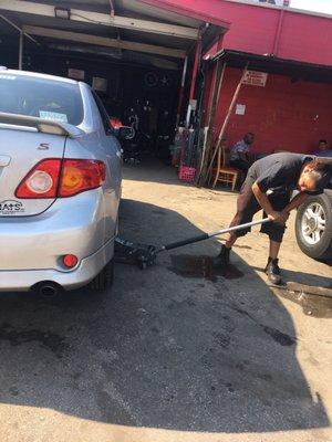 One of my workers at Charley's Tires getting right to work.