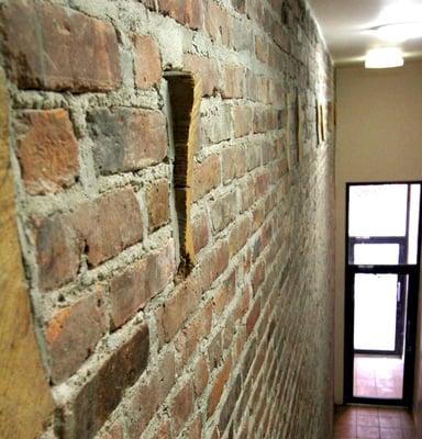 Original Wooden Beams in Exposed Brick Wall, 152 Orchard.