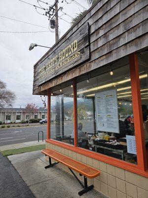 Outdoor sign next to the takeaway window