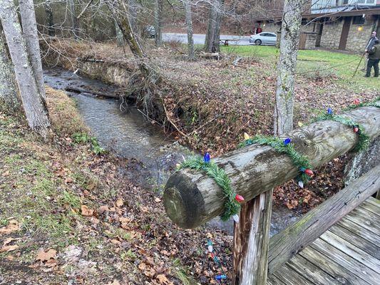 Beautiful streams with wooden bridges decorated for Christmas!