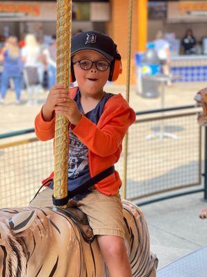 Enjoying his ride on a tiger