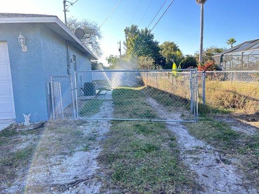 The tenants took down my gate, destroyed them and added this white one, so they could drive in my backyard