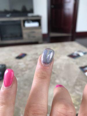 Charge me an extra $5 for chrome and Tammy didn't even cover the whole nail. There are scratches up at the top that she would not fix.