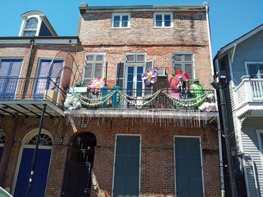 Balcony adorned with Mardi Gras beads
 (New Orleans Fat Tuesday Food Tour of the French Quarter | September 2022 | Guide: Roger)