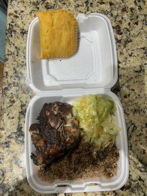 Jerk Chicken, cabbage, rice & peas, and Mild Beef Patty