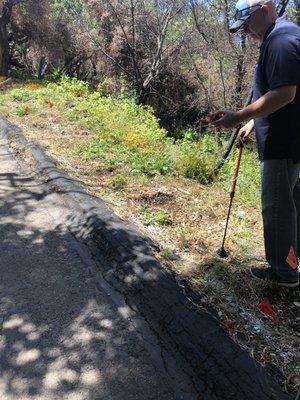 National Leak Specialists using a hydrogen detector on a job.