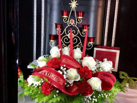 Classic Christmas centerpiece from Flowers by Rose , your florist in Richmond Hill and the surrounding area. Call us today or order online!