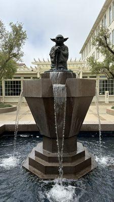 Yoda Fountain in front of building