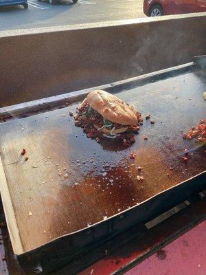 Torta piled high with Al Pastor.