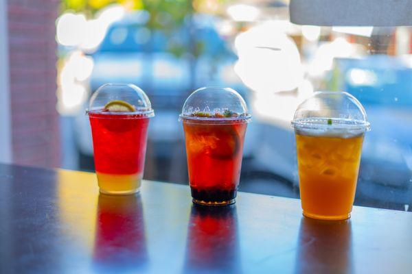 Hibiscus Lemonade, Angels Kiss, and Peachy Passion (from left to right). Three of our specialty teas, perfect for cooling down on a hot day!