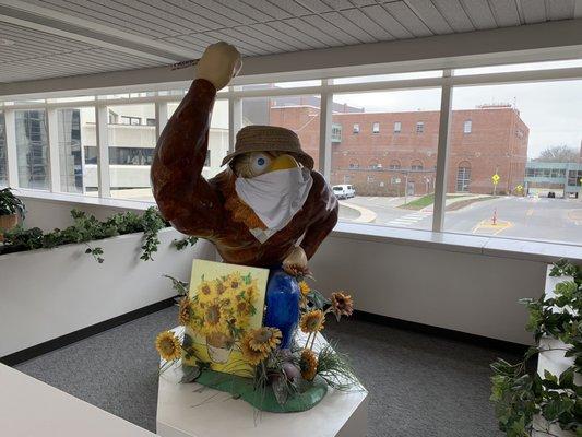 Be safe. Even Herky the Hawk wears a mask! Herky statues greet visitors to the UIHC buildings at the University of Iowa.