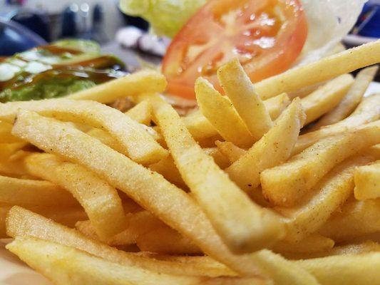 Grilled chicken with teriyaki avocado, french fries