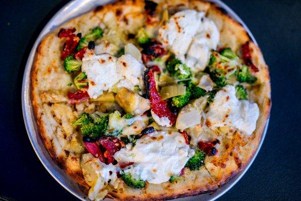 BROC YOUR SOCKS OFF 
 Garlic And Olive Oil Base, Artichoke, Broccoli,
 Sun-Dried Tomato, Whipped Lemon Ricotta, Shredded Mozzarella