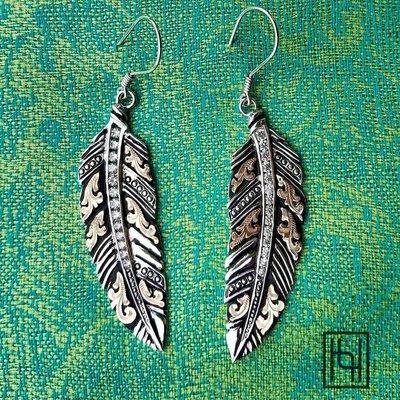 A tribute to the old west, she'll love these rose gold and sterling silver Feather Earrings by Hyo Silver.