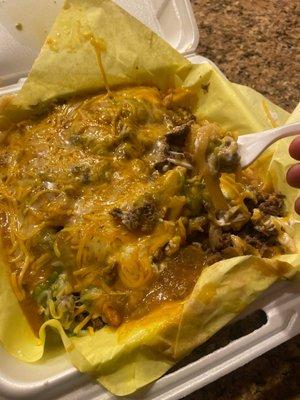 Smothered Carne asada fries