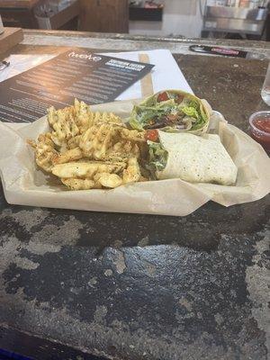 Veggie wrap and waffle fries