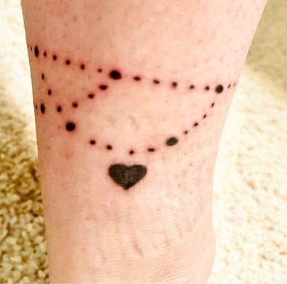 Anklet tattoo with a heart for my heart, my daughter done by Byron