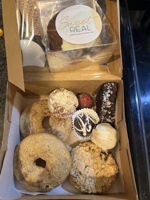 Boxed items are: donuts, oatmeal raisin cookies, peanut butter bombs, Oreo cookie bomb, red wine brownie.  Yum!!!