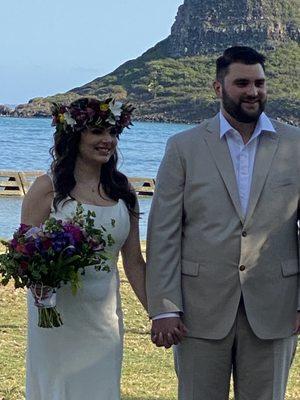 Our wedding couple at Kualoa Regional Park, O'ahu. Chinaman's Hat island is in the background