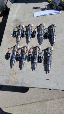 8 new OEM Motorcraft injectors.