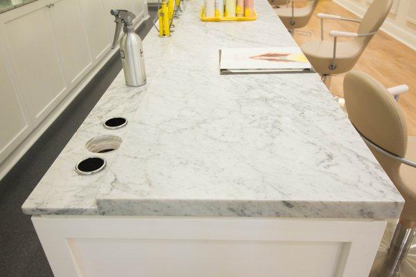 This elegant and timeless Bianco Carrara Marble from Italy was the perfect choice for this Dry Bar. It's available today to fit your project