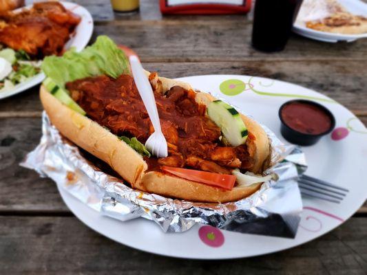 Chicken sandwich on homemade bread.