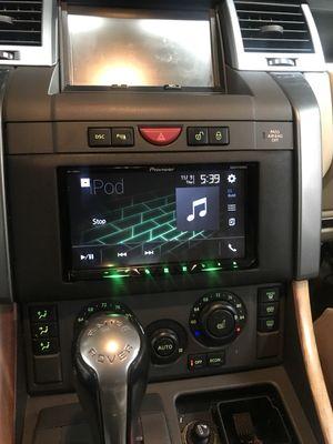 A unique custom installation of a beautiful AV Unit in a earlier model Land-rover Range Rover