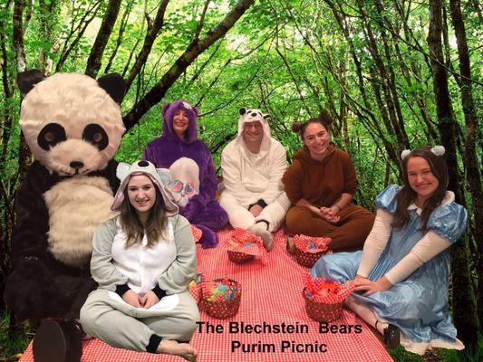 My crazy family having a teddybear picnic. Dr Ali- I am in the purple carebear.