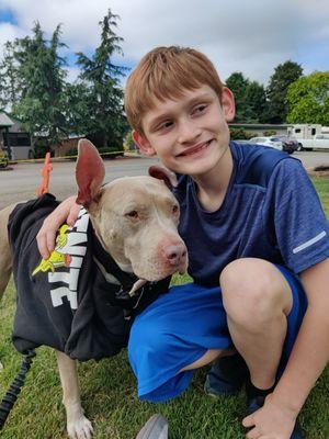 Happy grandson and his dog