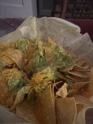 Apparently "side of chips and guac" means "nachos, hold everything but chips and guac."