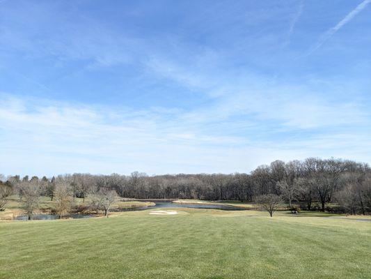 Approach on 10. A big downhill slope reveals a cool backdrop where you can see three greens jutting out into the water.