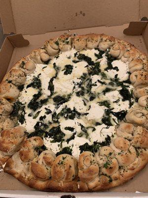 Ricotta and spinach pizza with garlic knot crust (approx $30). Delicious, but the garlic knots were not fully cooked