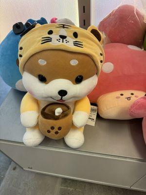 Shiba with boba and lion costume?