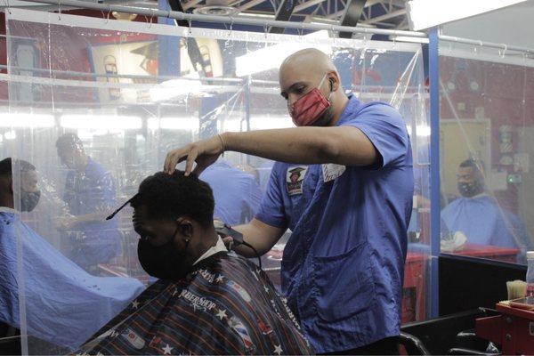 Student Cuts Hair.